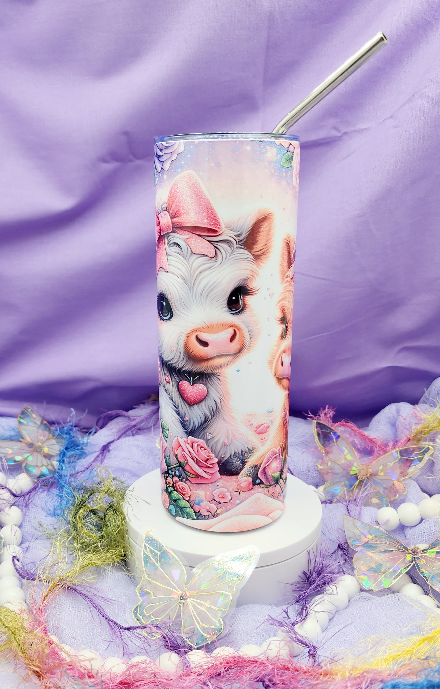 The design showcases the Highland cow in a stunning array of hues, blending bold and pastel tones to create a unique, eye-catching aesthetic. Each detail of the cow’s fur is intricately rendered, capturing the essence of this beloved animal in a way that is both playful and elegant by Tumbler Funatics.