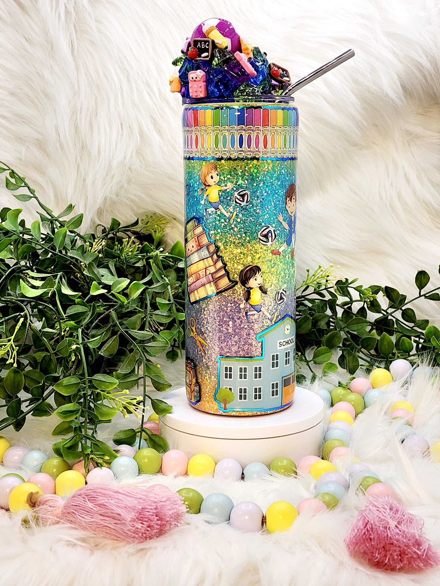 Perfect for teachers, administrators, and anyone passionate about education. The tumbler features a delightful design inspired by the school environment. Vibrant illustrations of classic school elements such as books, pencils, apples, chalkboards, and graduation caps adorn the tumbler's surface. The design evokes a sense of nostalgia and appreciation for the teaching. A custom lid topper available by Tumbler Funatics.